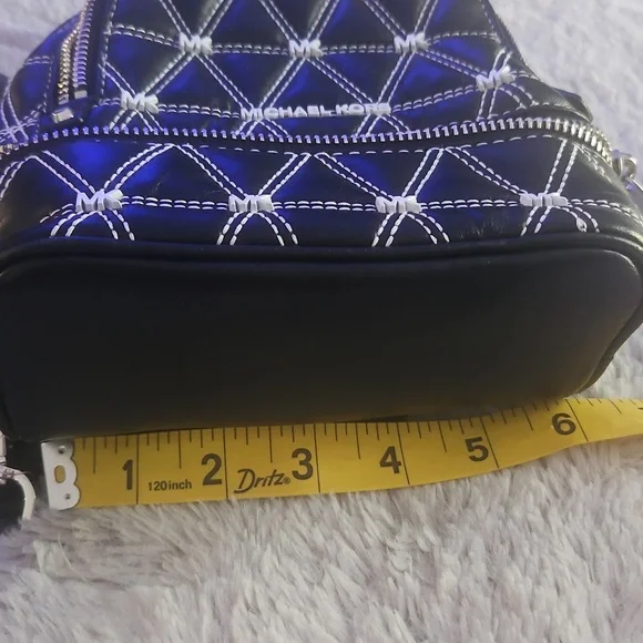 Michael Kors Black and White Quilted Backpack - Picture 9 of 12